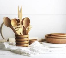 various wooden objects in a wooden jar photo