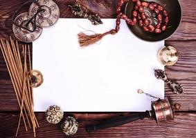 blank white sheet and antique religious objects photo