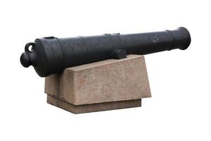 old black cast iron cannon on marble pedestal photo