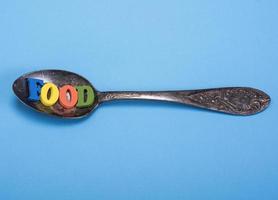 iron vintage spoon and inscription food photo