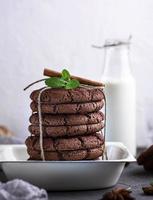 baked round cookies tied with a rope in an iron plate photo