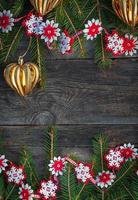 Christmas gray wooden background with toys and a garland photo