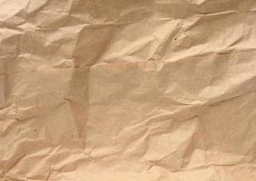 Texture of brown crumpled craft paper, full frame photo