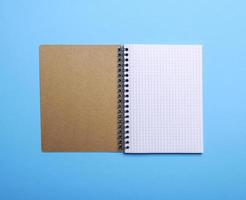 open blank notebook in a box photo