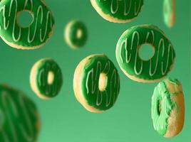 sweet green donuts levitate on a green background photo
