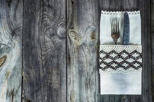 Cutlery fork and knife decorated with vintage cloth photo