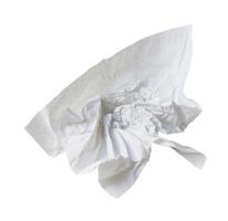 Single screwed or crumpled tissue paper or napkin in strange shape after use in toilet or restroom isolated on white background with clipping path. photo