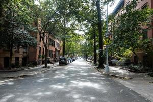 View down a street in Brooklyn, New York on a sunny day photo