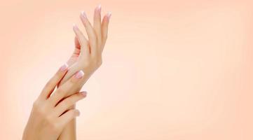 Beautiful female hands, closeup shot photo