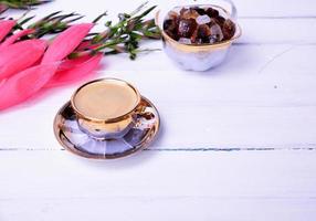 Espresso coffee on a white wooden surface photo