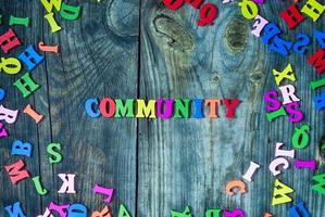 Word community from small multi-colored letters photo