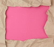 Retro brown paper torn, great design for any purposes. Pink banner photo