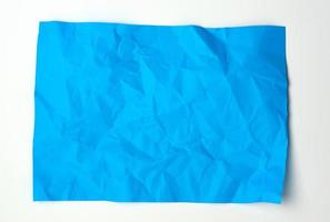 crumpled blue rectangular sheet of paper photo