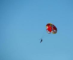 Parachute against the backdrop of clear sky photo