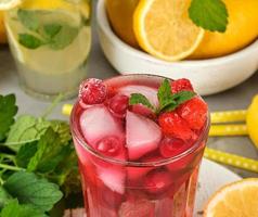 red strawberry lemonade in a glass photo