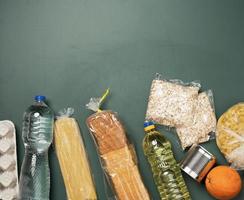 various products, fruits, pasta, sunflower oil in a plastic bottle and preservation, photo