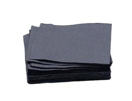 Stack of disposable black paper tissues for face and hands photo