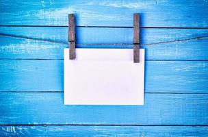 White paper envelope hanging on a rope photo