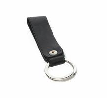 metal ring with leather key holder on white background photo