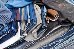 Samples of cloth and fabrics in different colors found at a fabrics market in Germany photo