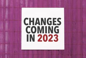 Notebook with Tools and Notes with text changes coming in 2023 photo
