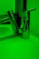 Green lighting bathroom photo