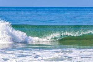 Extremely huge big surfer waves at beach Puerto Escondido Mexico. photo