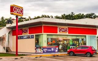 Puerto Escondido Oaxaca Mexico 2022 Oxxo supermarket shop store at road street gas station Mexico. photo