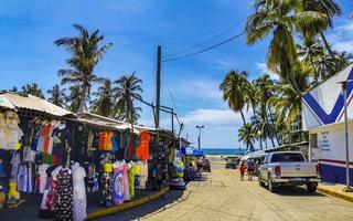 Puerto Escondido Oaxaca Mexico 2022 Busy road street driving cars traffic jam Puerto Escondido Mexico. photo