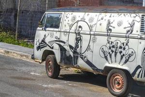 Playa del Carmen Quintana Roo Mexico 2021 Old black broken dirty VW bus Volkswagen car rusting Mexico. photo