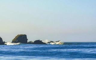 Extremely huge big surfer waves beach La Punta Zicatela Mexico. photo