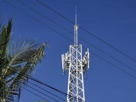 Red white 5G tower radiation in Puerto Escondido Mexico. photo