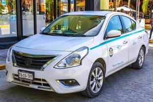 Playa del Carmen Quintana Roo Mexico 2021 White turquoise taxi cab car Playa del Carmen Mexico. photo