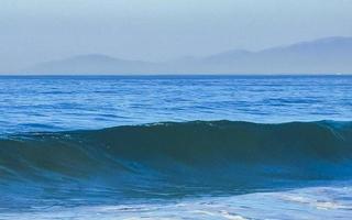 Extremely huge big surfer waves at beach Puerto Escondido Mexico. photo