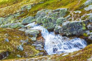 Gorge rocks cliff and waterfall river Rondane National Park Norway. photo