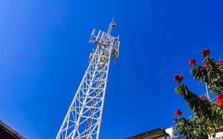 Red white 5G tower radiation in Puerto Escondido Mexico. photo