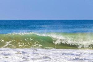 Extremely huge big surfer waves at beach Puerto Escondido Mexico. photo