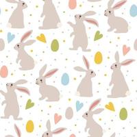 A pattern of gray Easter bunnies and colored Easter eggs. Different bunnies for kids. Rabbit or hare, a spring festive animal for Easter. Cartoon simple vector character made of fabric. Packaging