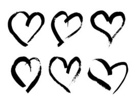 Hand drawn brush hearts. Set of six grunge black doodle hearts on white background. Romantic love symbol. Vector illustration.