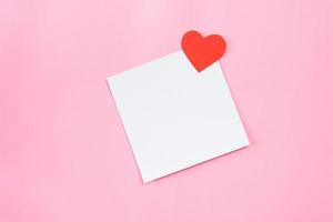 Square white paper with sweet little heart for greeting card mockups photo