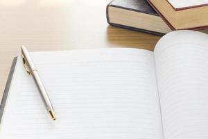 Pen and Notebook open blank page photo
