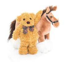 Teddy bear and horses photo