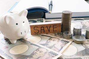 Piggy bank and saving money concept photo