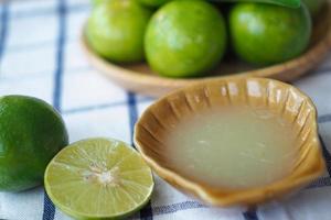 Freshly squeezed lemon juice in a cup photo