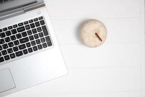 Laptop on table, top view, copy space photo