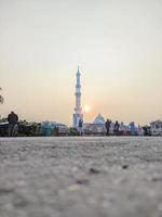 Free photo sunset with muslim mosque