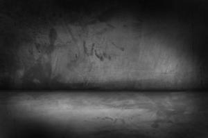 Black, dark and gray abstract cement wall and studio room , interior texture for display products. Room black floor is made of dark plaster. photo