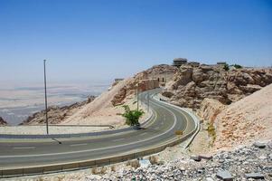 Al Ain Jabal Hafeet Mountain Landscape Views of Al Ain with Blue Sky Background photo