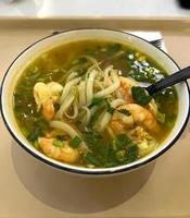 Soup with shrimp, natural crab and noodles photo