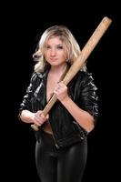 Angry girl with a bat in their hands photo